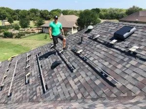 Roofer Installing Asphalt Roof