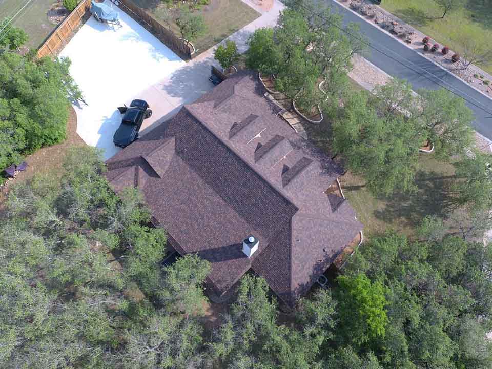 House with New Roof Shingles