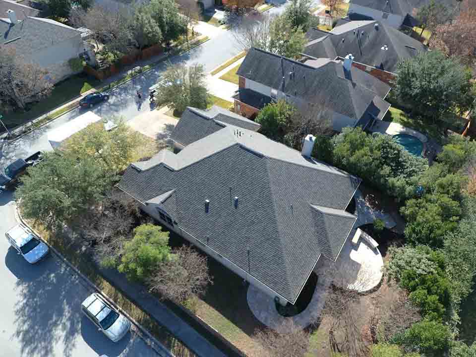 Residential House with New Asphalt Shingle Roofing
